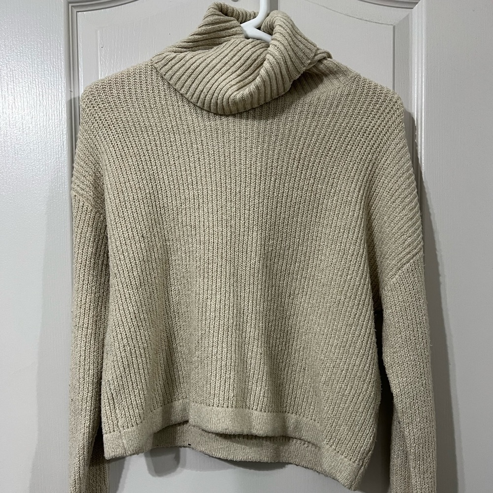 White turtleneck sweater